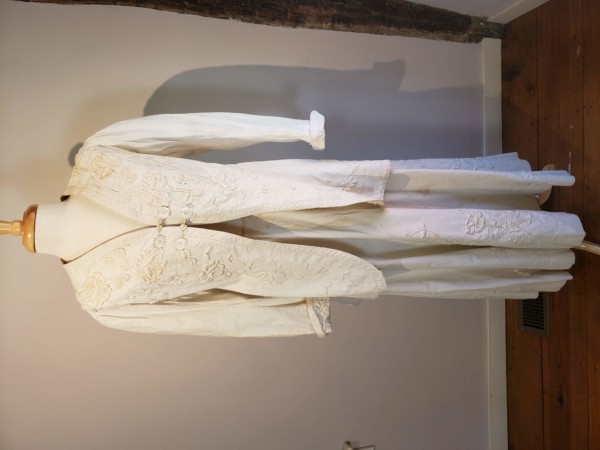 A c. 1910 dress consisting of a skirt and coat.